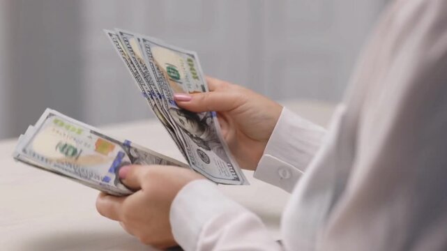 Businesswoman Counting Cash in Corruption and Financial Crime Concept