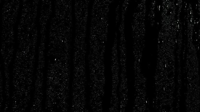 Rain Droplets Running Down Black Glass Background