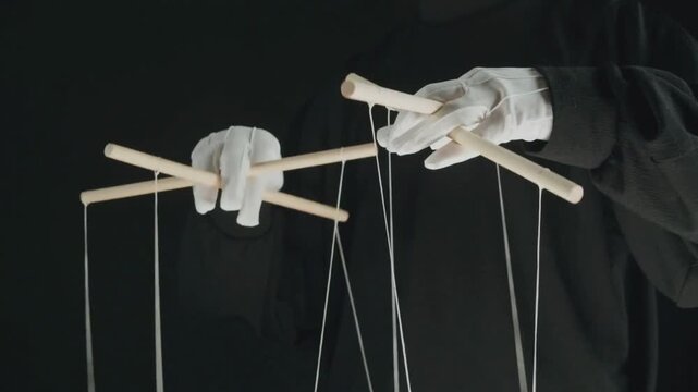 Puppet Master Controlling Marionettes In Political Theater