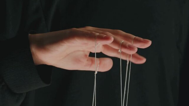 Puppeteer Controlling Marionettes Symbolizing Political Power