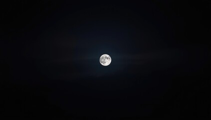 Obraz premium Luminous moon casting light over a pitch black sky