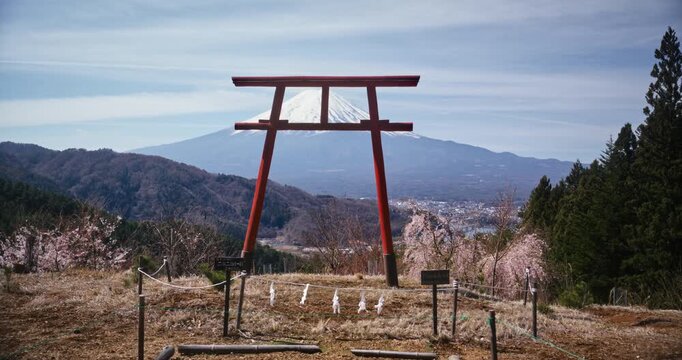 Slow motion movement in on tore gate with beautiful view of mt. fuji - wide shot