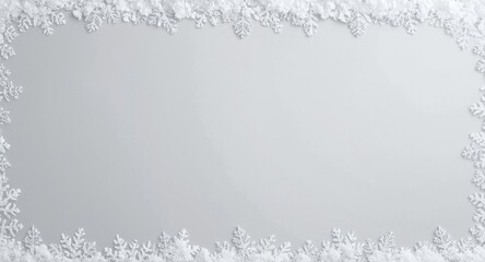 Obraz premium Winter holiday scene with snowflake border on pale gray background and empty space
