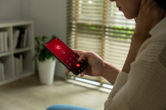 Woman calling emergency number 911 for crisis situation