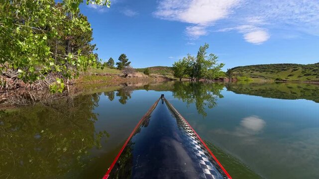 Immersive POV from a kayak - paddling on Horsetooth Reservoir in Fort Collins, Colorado, late spring scenery 