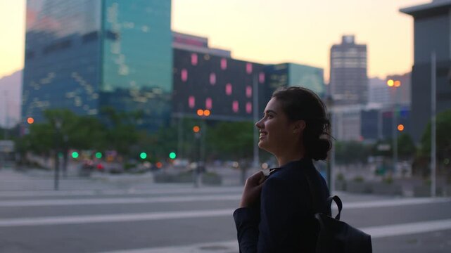 Thinking, college student or woman in city at night for commute, learning inspiration or remember class. Evening, lesson reflection and scholar with smile for education, travel or bokeh in urban town