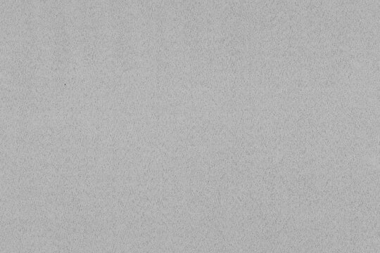 Gray textured background with a subtle, speckled pattern