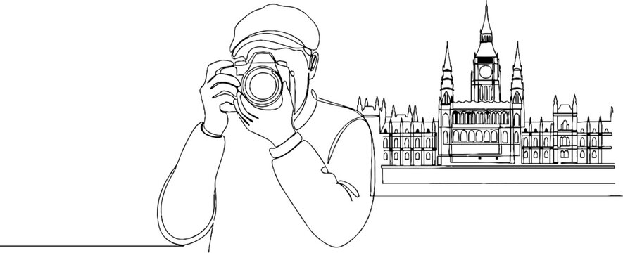 Person photographing famous historic landmark with DSLR camera.