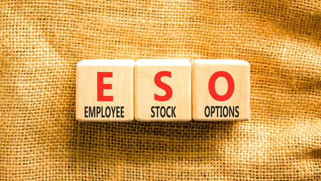 ESO employee stock options symbol. Concept words ESO employee stock options on beautiful wooden blocks. Beautiful canvas background. Business ESO employee stock options concept. Copy space.