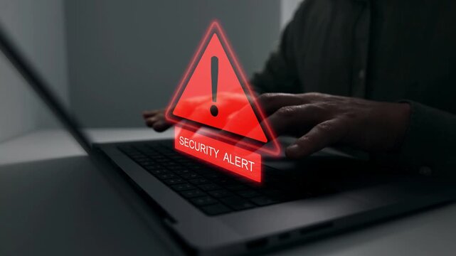 Security alert notification on computer screen showing cyber attack risk, data protection concept, online privacy warning and digital safety technology.