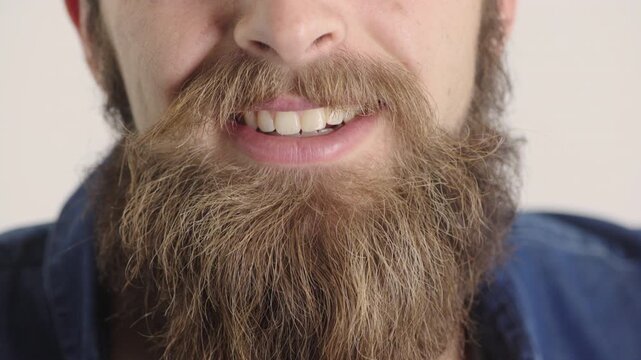 Laughing, man and dental care for healthy teeth, veneers and clean mouth for fresh breath or closeup. Tooth whitening, wellness and person with oral hygiene results, beard and treatment for gums