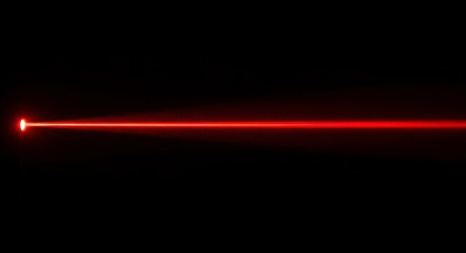 Straight bright red laser beam projected horizontally across a deep solid black background atmosphere