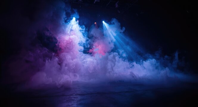 Theatrical fog effects created by an electric smoke machine with dry ice on stage in dramatic lighting