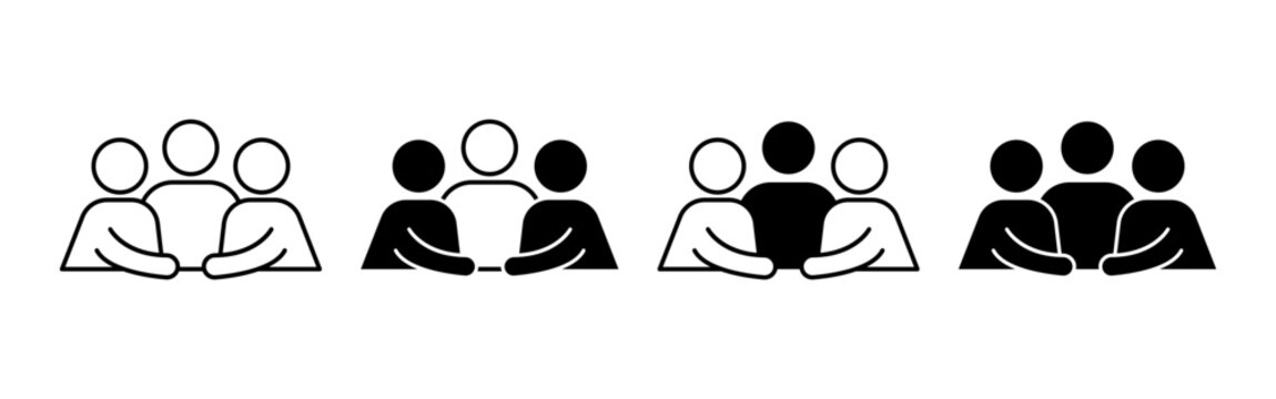 Four groups of people sitting together at tables