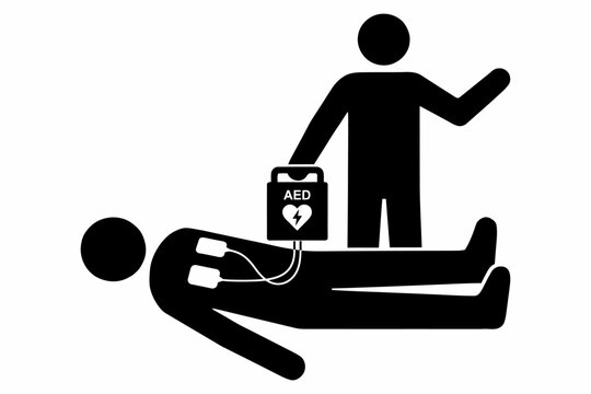 Person Using Automated External Defibrillator On Patient