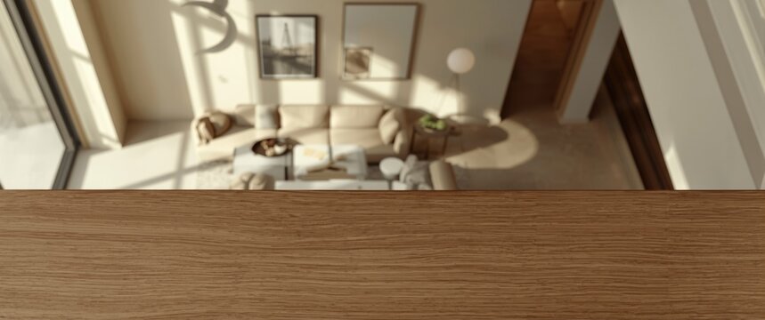 High viewpoint of minimalist living room interior emphasizing empty wooden drawer surface and understated art on beige colored walls