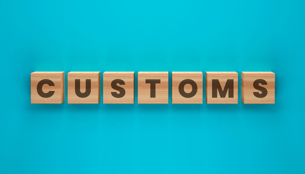 The word CUSTOMS spelled out in wooden blocks on a vibrant teal background.