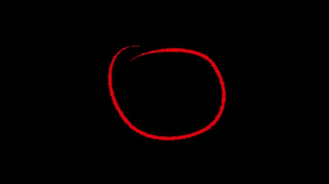 Hand drawn red scribble circle shape isolated on a plain black background 