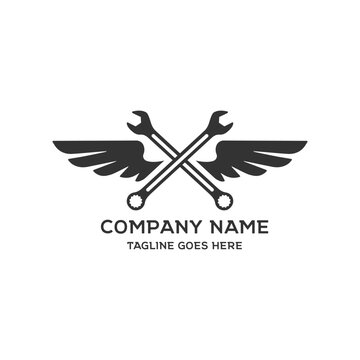 Vintage Winged Crossed Wrench Logo Vector Illustration