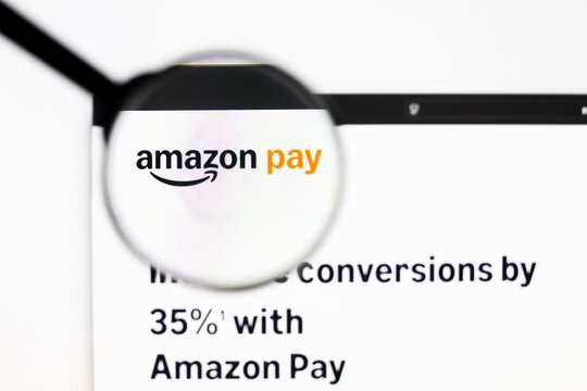 Milan, Italy 2026, 20 Apr Closeup of Amazon Pay website on a laptop screen. Amazon Pay logo under a magnifying glass.