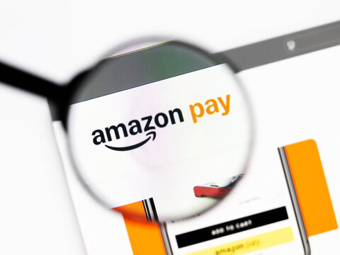 Milan, Italy 2026, 20 Apr Closeup of Amazon Pay website on a laptop screen. Amazon Pay logo under a magnifying glass.