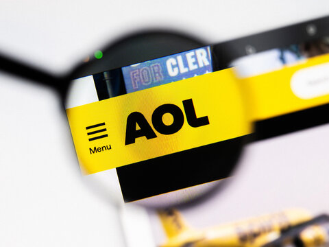 Milan, Italy 2026, 20 Apr Closeup of AOL website on a laptop screen. AOL logo under a magnifying glass.