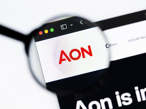 Milan, Italy 2026, 20 Apr Closeup of Aon website on a laptop screen. Aon logo under a magnifying glass.