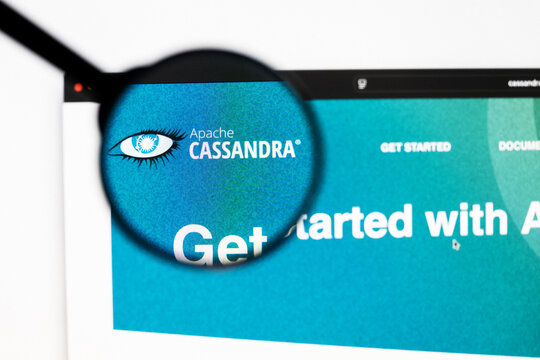 Milan, Italy 2026, 20 Apr Closeup of Apache Cassandra website on a laptop screen. Apache Cassandra logo under a magnifying glass.