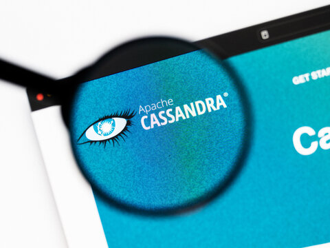Milan, Italy 2026, 20 Apr Closeup of Apache Cassandra website on a laptop screen. Apache Cassandra logo under a magnifying glass.