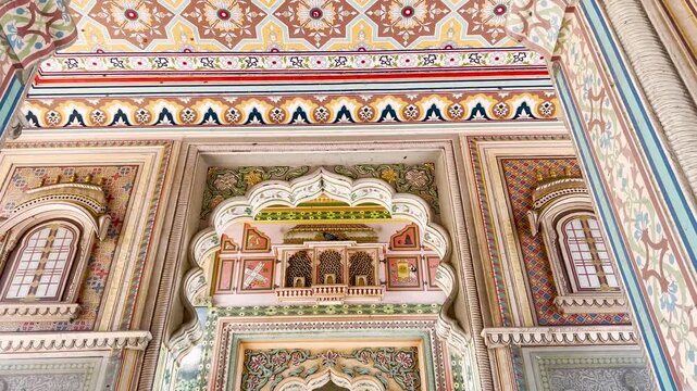 Detailed interior view of Patrika Gate showcasing ornate arches, colorful murals, and traditional architectural designs in Jaipur, Rajasthan, India.