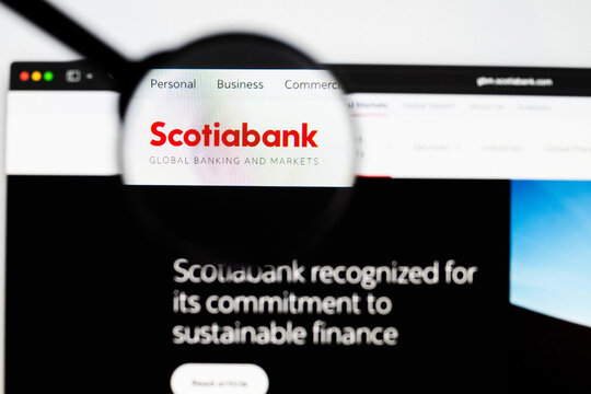 Milan, Italy 2026, 20 Apr Closeup of Bank of Nova Scotia website on a laptop screen. Bank of Nova Scotia logo under a magnifying glass.
