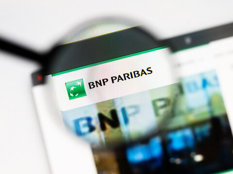 Milan, Italy 2026, 20 Apr Closeup of BNP Paribas website on a laptop screen. BNP Paribas logo under a magnifying glass.