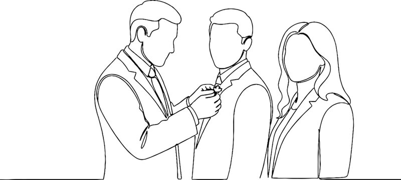 Man helping another adjust his necktie formally indoors.