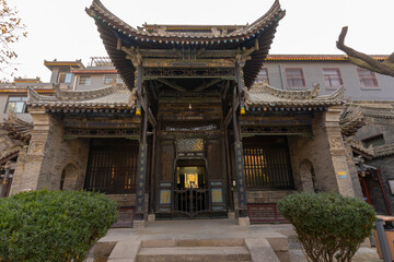 Fototapeta premium The Historical Great Mosque of Xi'an with blue sky in Xi'an, China