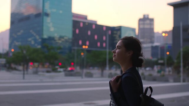 Night, student and woman with thinking in city for commute, learning inspiration and remember lesson. Evening, class reflection and scholar with idea for university assignment, travel and education