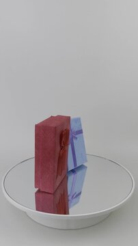 4K Vertical Luxury Product Showcase Gift Boxes Rotating Counter Clockwise