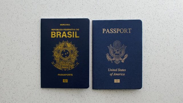 Brazilian passport alongside the American passport: symbols of global connection and international travel.
