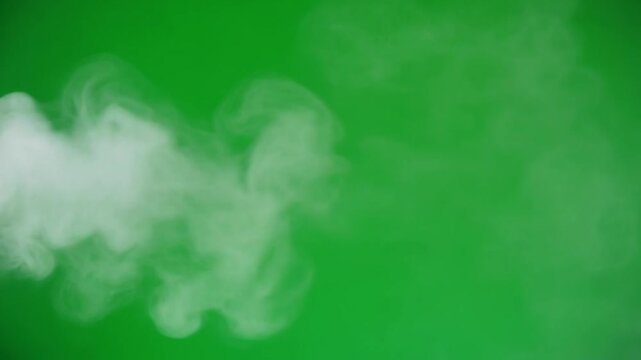 White puff of smoke and steam swirl vector icon on chroma key green screen background