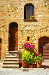 Naklejka premium View of the ancient palaces in Pienza, medieval village of Tuscany (Province of Siena, Italy); is world famous for its renaissance monuments.