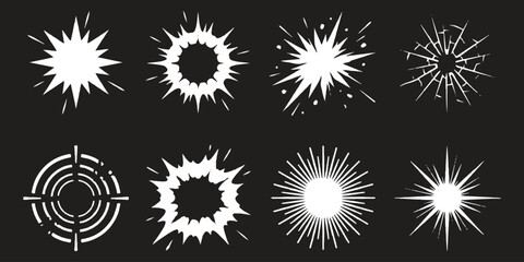 Set of white comic book explosion and starburst shapes on a dark background © md