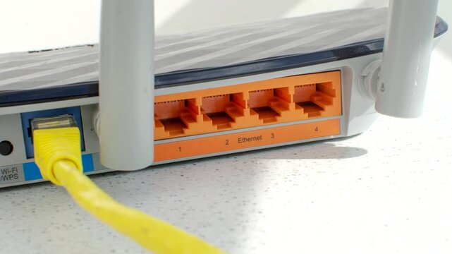 Detail of the rear ports of the advanced Wi-Fi router, showcasing technological innovation for a faster and more stable connection.