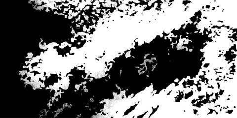 Fototapeta premium An abstract black and white composition of irregular shapes and textures, creating a visually striking and modern graphic design element.