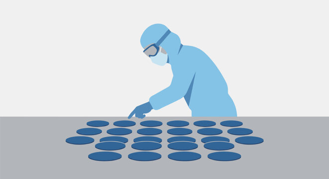 Scientist in protective suit inspecting silicon wafers in a cleanroom environment for semiconductor manufacturing and high-tech electronics production in a laboratory setting