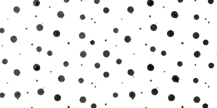 Black and grey dots pattern with varying circle sizes on a simple artistic background