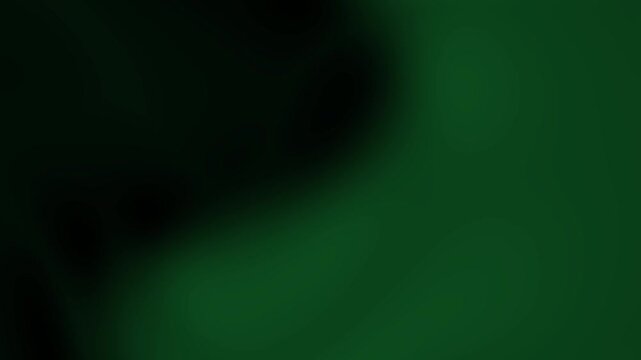 Ideal for website banners, social media posts, or presentation slides, this abstract dark green gradient background with a light shade is soft and textured.