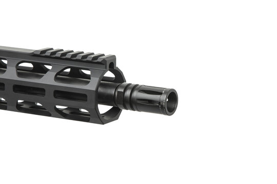 Close-up of a tactical rifle muzzle flash hider on white back