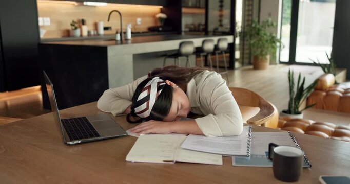 Woman, sleeping and burnout with laptop in home for remote work, deadline and paperwork for startup. Tech, documents and tired freelance person with fatigue, rest or exhausted with project overtime