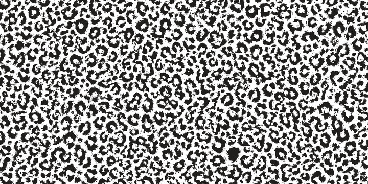 Black and white leopard animal print pattern with abstract spots