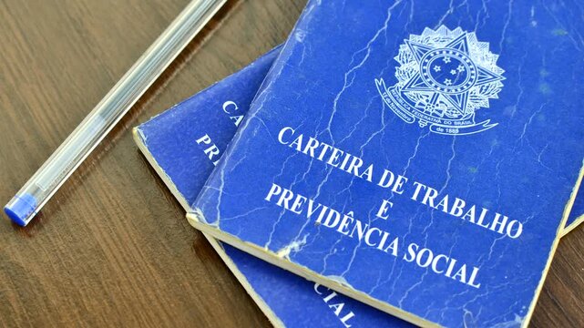 Brazilian work ID on a wooden surface, symbolizing employment and career in the Brazilian context.