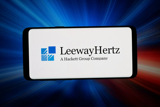 Stuttgart, Germany - 06-02-2026: In this photo illustration, the logo of AI development company LeewayHertz is displayed on a smartphone in front of abstract background on computer screen.